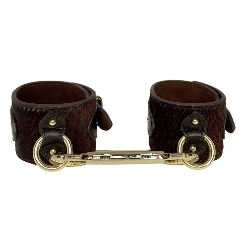 Image of pony leather bondage wrist cuffs